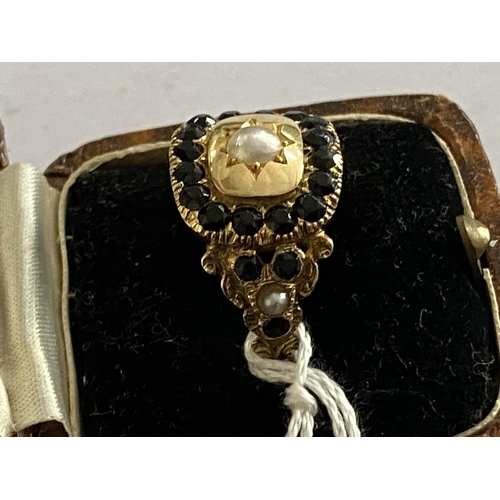 100 - stunning georgian mourning ring in outstanding condition for the age. Stones are thought to be jet a... 