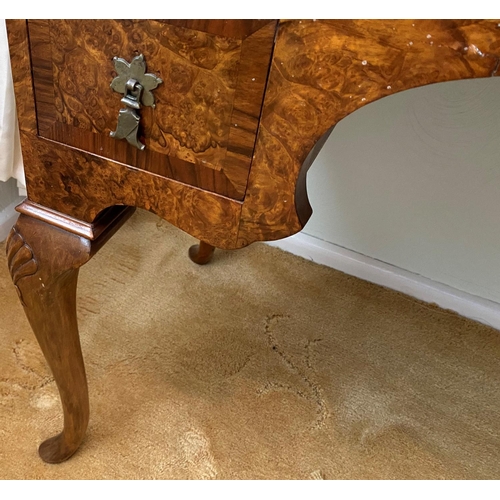 115 - figured walnut cylinder desk on carved gabriole legs with a fitted interior, inkwells with original ... 