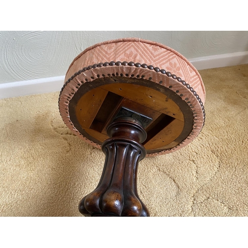 119 - Victorian adjustable walnut piano stool with upholstered circular seat. The base is supported by a w... 