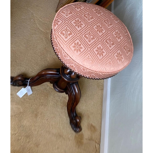 119 - Victorian adjustable walnut piano stool with upholstered circular seat. The base is supported by a w... 