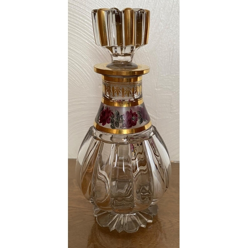 125 - Antique crystal decanter with gilded decoration and roses in stunning condition