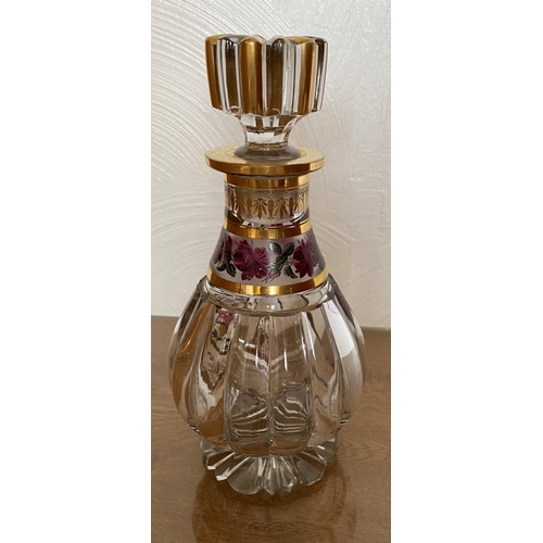 125 - Antique crystal decanter with gilded decoration and roses in stunning condition