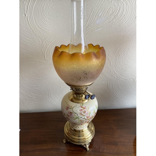 130 - Royal vienna alexander porcelain base oil lamp on ornate brass stand 22