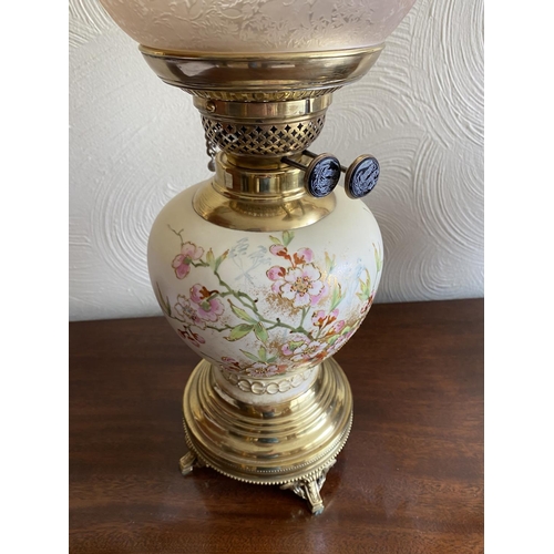 130 - Royal vienna alexander porcelain base oil lamp on ornate brass stand 22