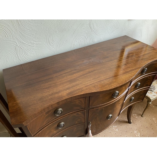 135 - Early 20th centiry serpentine sideboard 41