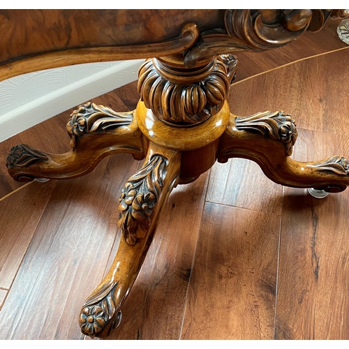 168 - Figured walnut games table, serpantine shape, english approx 1850 has some sun damage