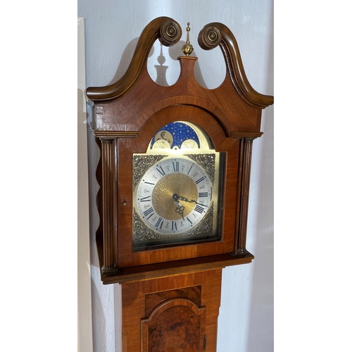 222 - Long case moon roller clock handmade walnutregency stlye. Urgos weight drivenmovement (black forest)... 