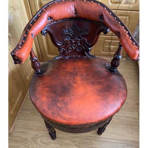 232 - Antique leather captains chair measures 21