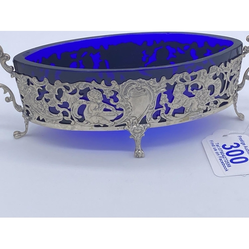 300 - silver bowl with blue glass liner features cherubs etc 800 continental grade silver totla weight of ... 