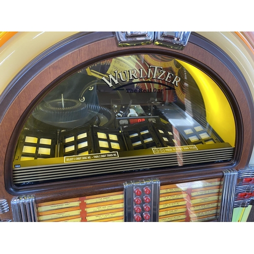 398 - Wurlitzer one more time 184/f91 jukebox in great condition with the bubble effect around the dome. T... 