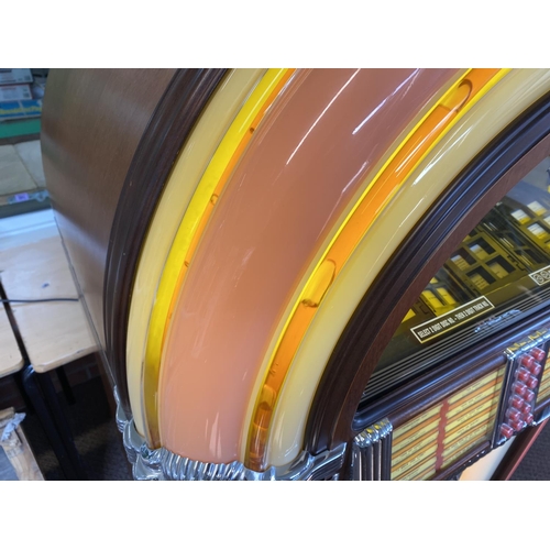 398 - Wurlitzer one more time 184/f91 jukebox in great condition with the bubble effect around the dome. T... 