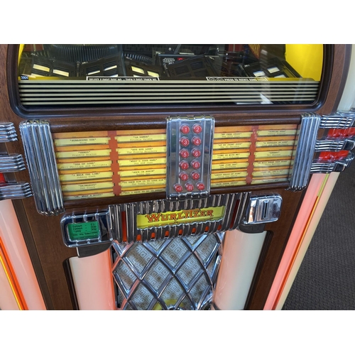 398 - Wurlitzer one more time 184/f91 jukebox in great condition with the bubble effect around the dome. T... 