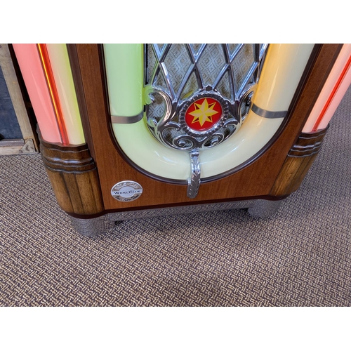 398 - Wurlitzer one more time 184/f91 jukebox in great condition with the bubble effect around the dome. T... 