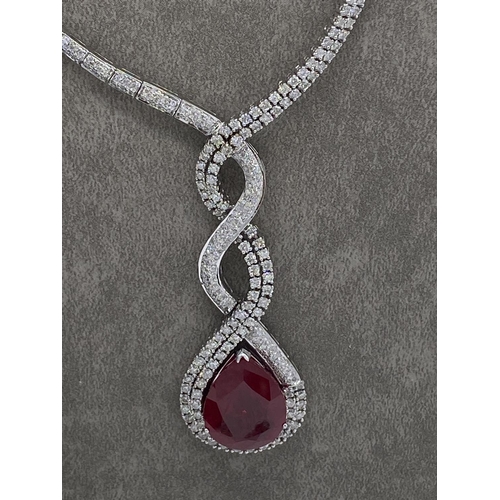 399 - Stunning diamond and ruby necklace, earings and ring set valued at ninety thousand pounds. The full ... 