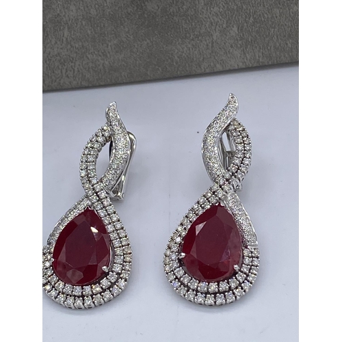 399 - Stunning diamond and ruby necklace, earings and ring set valued at ninety thousand pounds. The full ... 