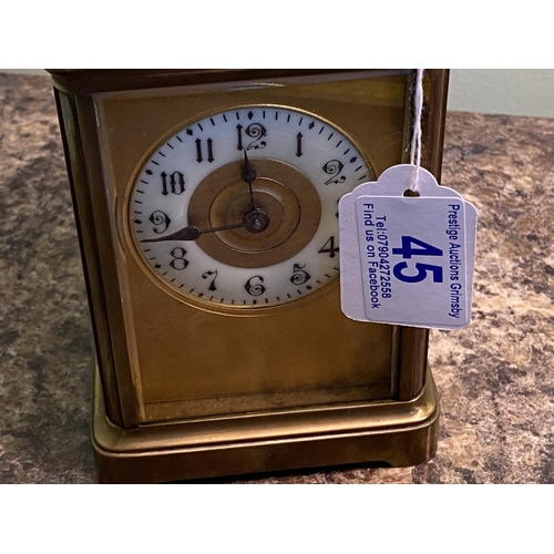 45 - vintage carriage clock with bevelled edge glass panels needs attention