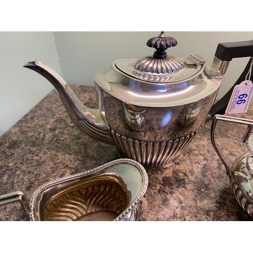 66 - sterling silver tea set includes tea pot,sugar bowl and milk jug weighs