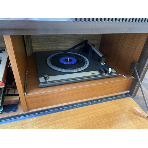 70 - mid century radiogram by grundig with record deck and it sounds great. Measures approx 46.5