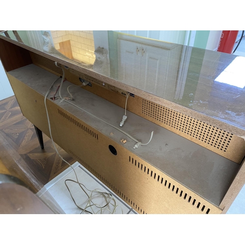 70 - mid century radiogram by grundig with record deck and it sounds great. Measures approx 46.5