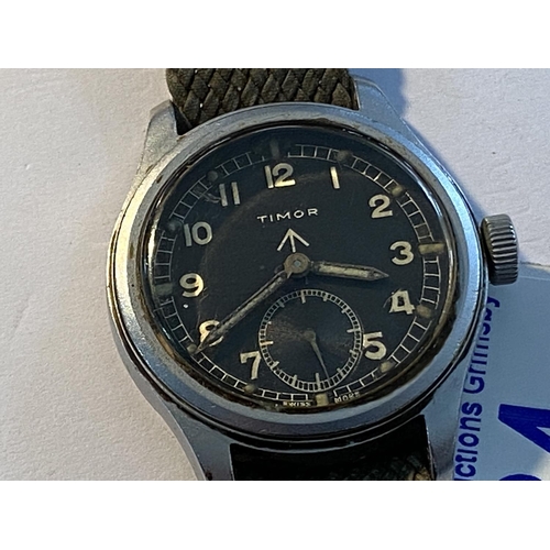 84 - Timor dirty dozen military watch circa 1940s is in good working order despite being stored for many ... 