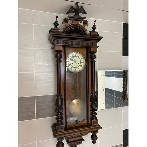 403 - Stunning older Vienna clock with eagle you top. In good coric condition and good working order. It i... 