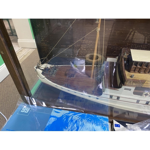 133 - MODEL BOAT OF THE BOHUSLAN MADE OF WOOD IN A LARGE GLASS CASE 36