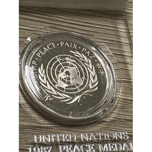 185 - UNITED NATIONS STERLING SILVER PROOF MEDAL IN A PRESENTATION BOX 1987 MINT CONDITION