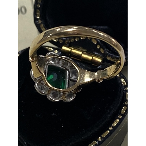 692 - EMERALD & DIAMOND RING. PLEASE SEE CERTIFICATE FOR FULL DESCRIPTION.