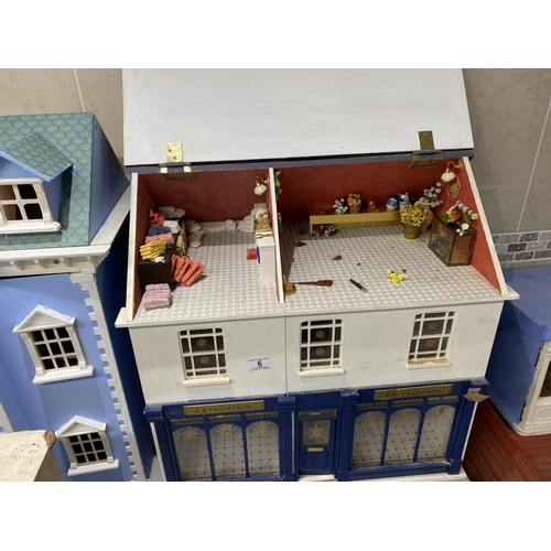 6 - DOLLS HOUSE SHOP WITH FLAT ABOVE INCLUDES SOME ACCESSORIES 60CM WIDE 37CM DEEP 59CM TALL