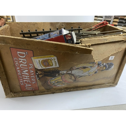 190 - ADVERTISING BOX FULL OF MAINLY BRASS TRACK O GAUGE
