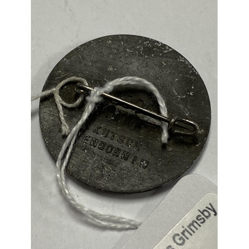 22 - WORN GERMAN BADGE