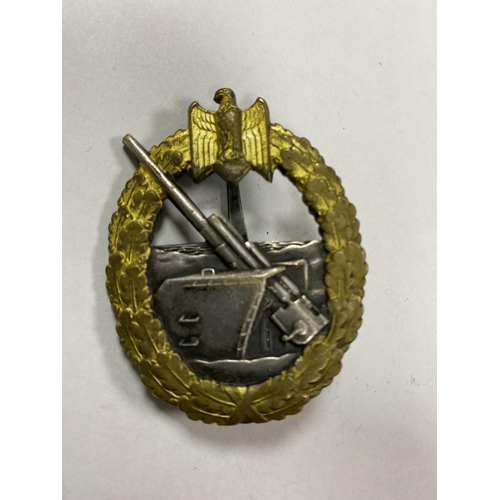43 - WW2 GERMAN COASTAL ARTILLARY BADGE WITH SCHWERIN BERLIN ON BACK