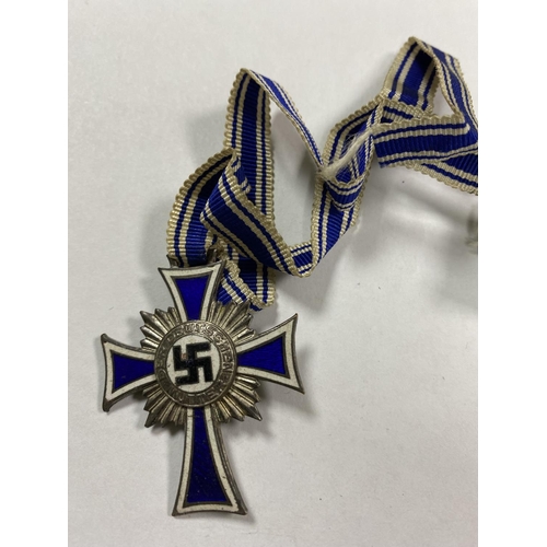 49 - GERMAN WW2 MOTHERS BADGE WITH 16TH DECEMBER 1938 ON THE BACK