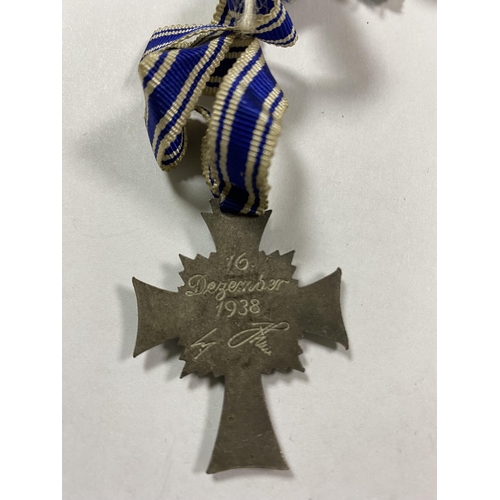 49 - GERMAN WW2 MOTHERS BADGE WITH 16TH DECEMBER 1938 ON THE BACK