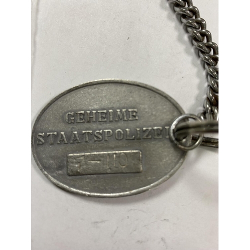 56 - GERMAN WW2 GESTAPO I.D BADGE WITH 7-110 ON THE BACK