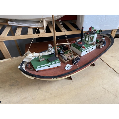 197 - MOTORIZED FISHING BOAT LENGTH 62CM WIDTH 25CM