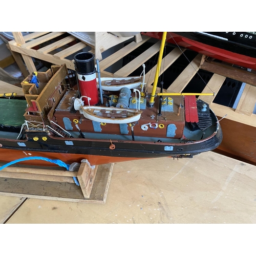 261 - MOTORIZED PASSENGER/CARGO BOAT LENGTH 84CM WIDTH 17CM