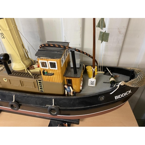 358 - MOTORIZED TUG LENGTH 106CM WIDTH 23CM