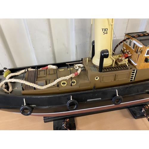 358 - MOTORIZED TUG LENGTH 106CM WIDTH 23CM