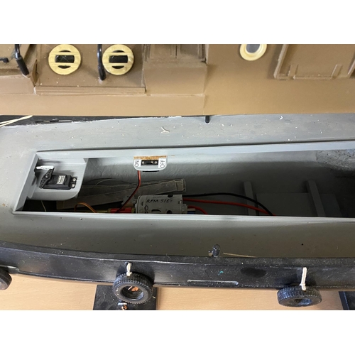 358 - MOTORIZED TUG LENGTH 106CM WIDTH 23CM