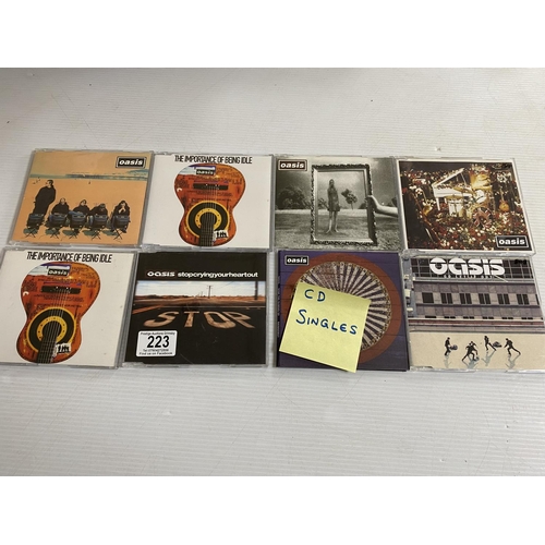 223 - 8 oasis cd singles