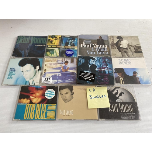 227 - 11 Paul young cd singles