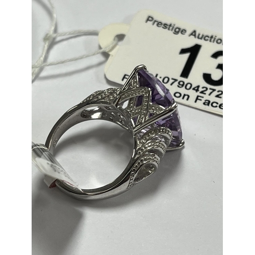 13 - STERLING SILVER TV CHANNEL RING SIZE N PURPLE STONE