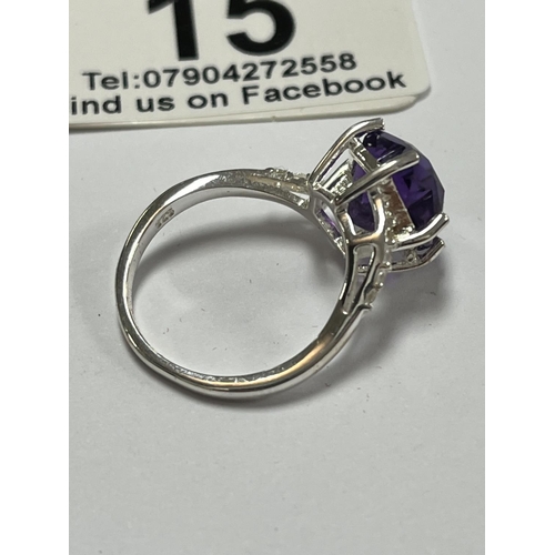 15 - STERLING SILVER TV CHANNEL RING SIZE N PURPLE STONE