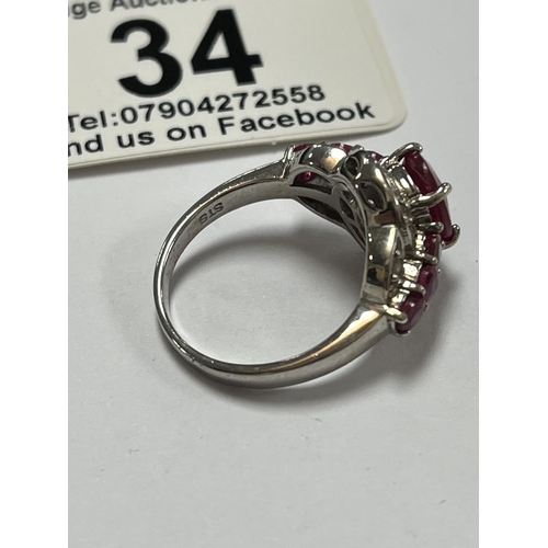 34 - STERLING SILVER TV CHANNEL RED STONE RING SIZE N