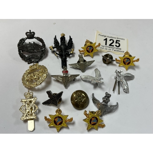 125 - ASSORTED MILITARY BADGES ETC.