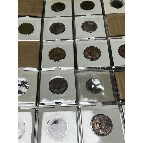 584 - FOLDER OF COLLECTABLE COINS