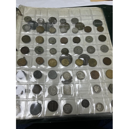 585 - FOLDER OF MIXED WORLD COINAGE