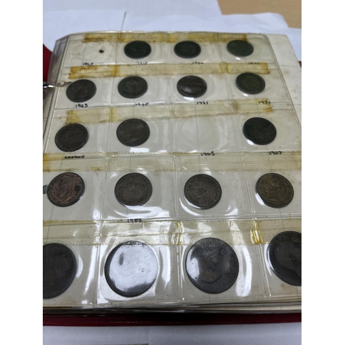 585 - FOLDER OF MIXED WORLD COINAGE