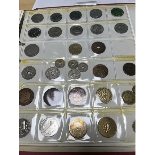 588 - FOLDER OF WORLD COINAGE